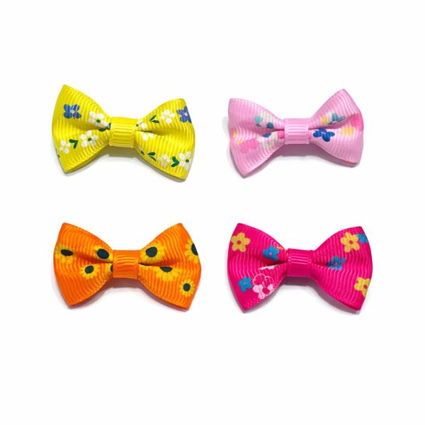 Hovedbilde 4pk blomstrede toppsløyfer med spenne